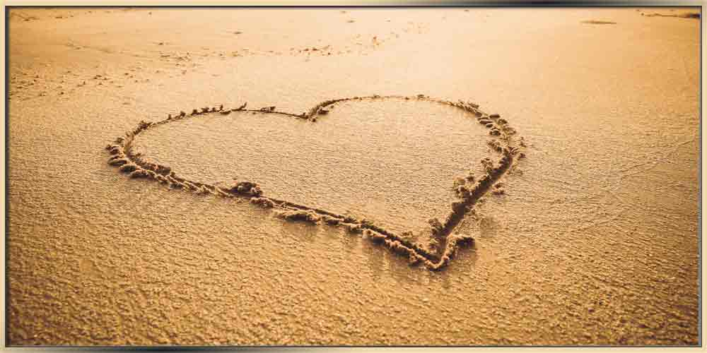 heart drawn on the sand image for blog 12 Amazing Symbolic Jewelry Designs