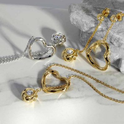 Twisted Hearts & Orbs ARY D'PO .925 sterling silver collection in 18K yellow gold and rhodium plated