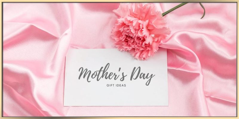 Mother's Day gift ideas card on a pink silk fabric with a pink flower
