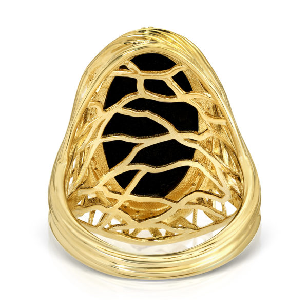 A ring in yellow gold with flack agate oval stone on top surrounded with diamond stones. The gold ring has a V-shaped pattern twisted band which branches like a tree of life with a double V for Victory and straight